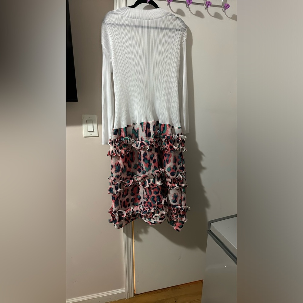This beautiful summer dress has never been worn